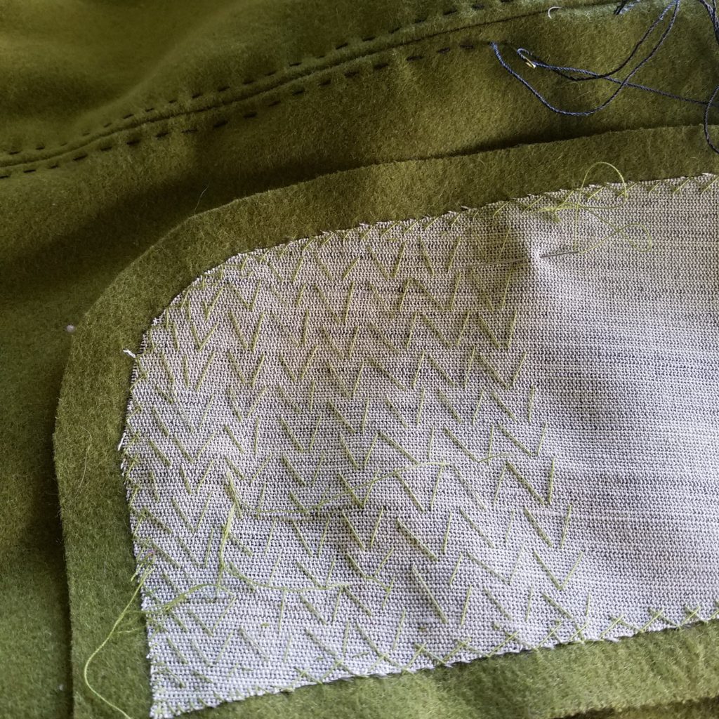 pad stitching the collar with horsehair interfacing
